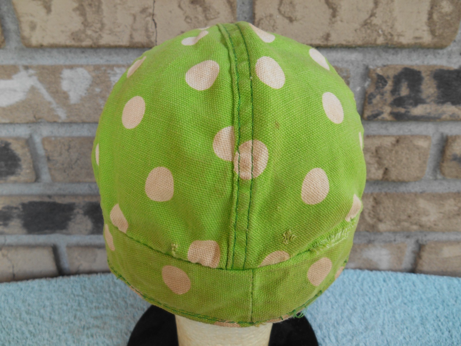 Vintage COTTON WELDERS CAP. GREEN & WHITE DOTS. SIZE SMALL 6-7/8. HAS HOLES!