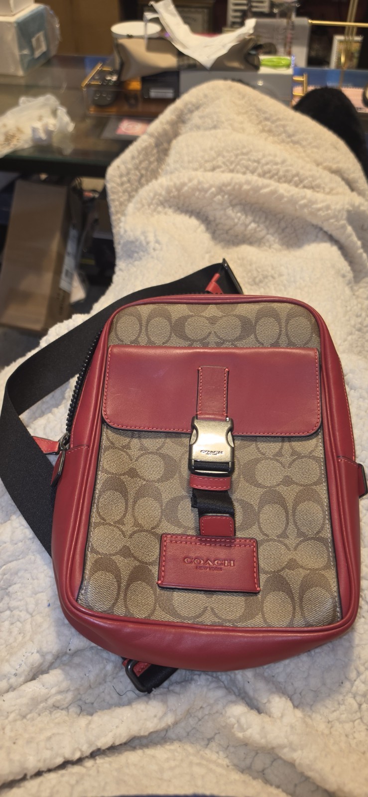 coach signature logo crossbody bag brown red zip buckle adjustable strap