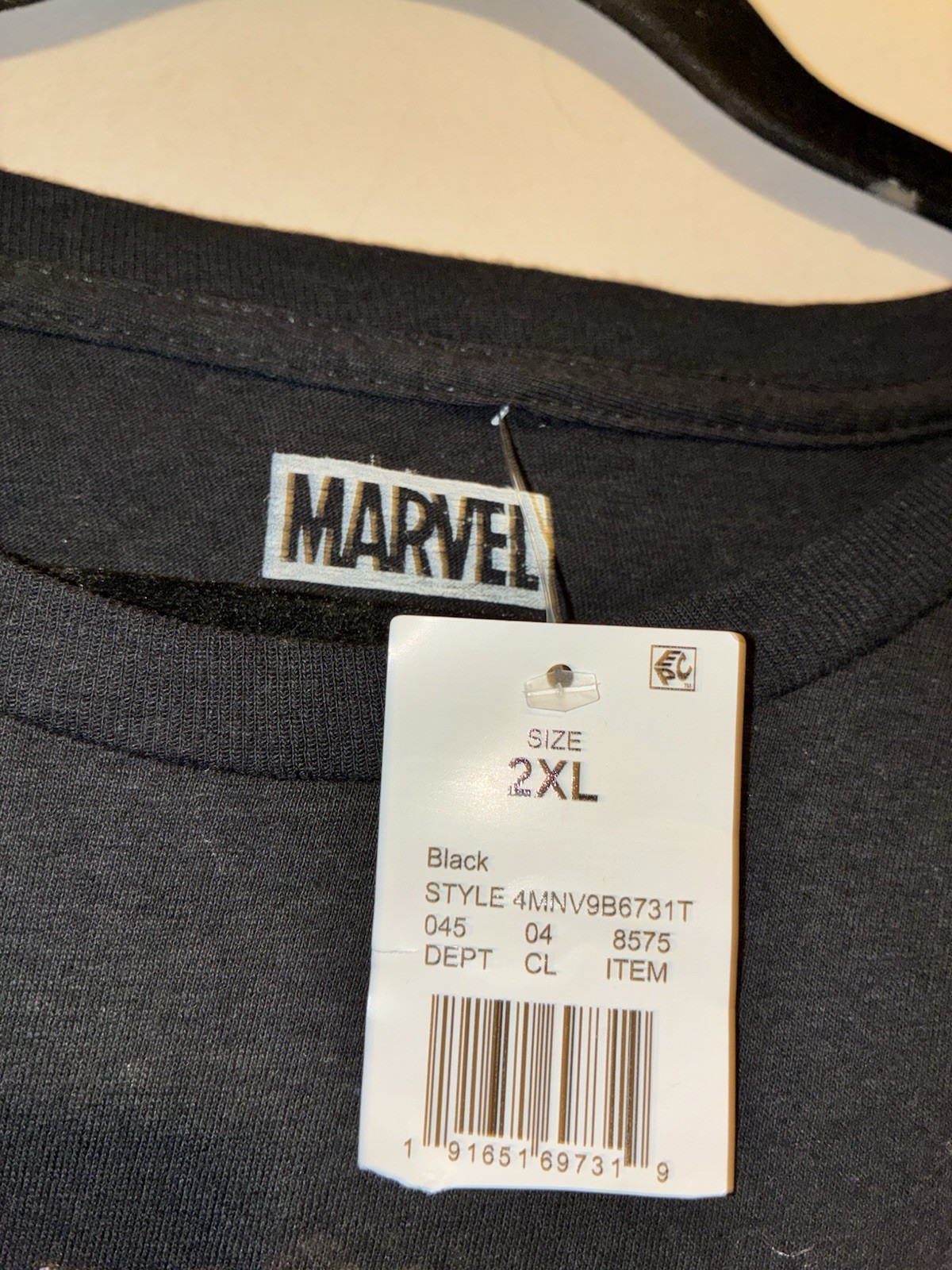 Marvel: black crewneck tee with vibrant neon purple, green, and teal Venom print