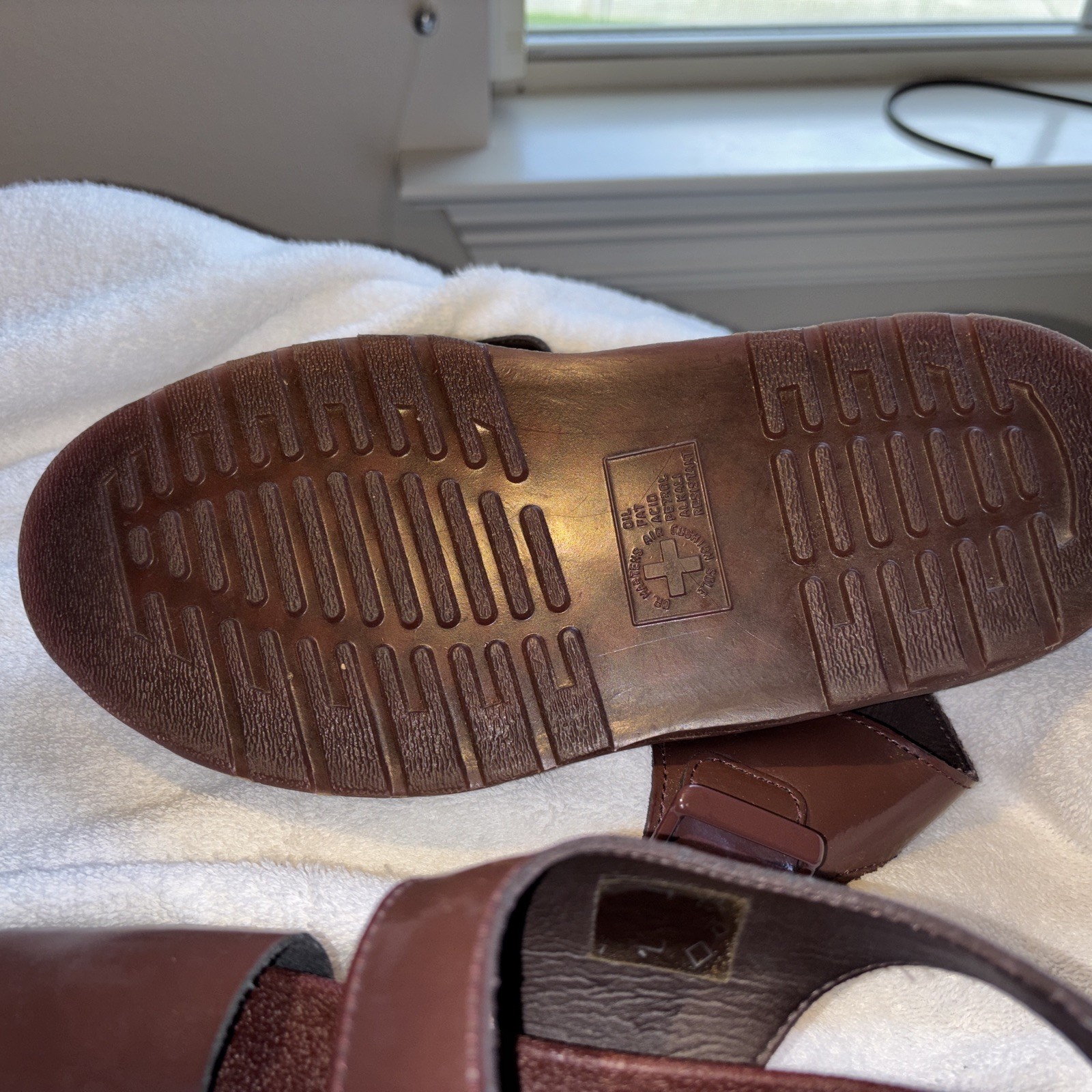 Dr. Martens Romi Y-Strap Sandals in an oxblood/brown patent leather finish