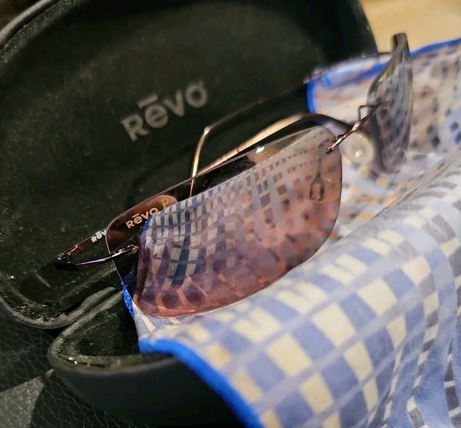 Sunglasses, Descend series, known for their rimless, lightweight design.