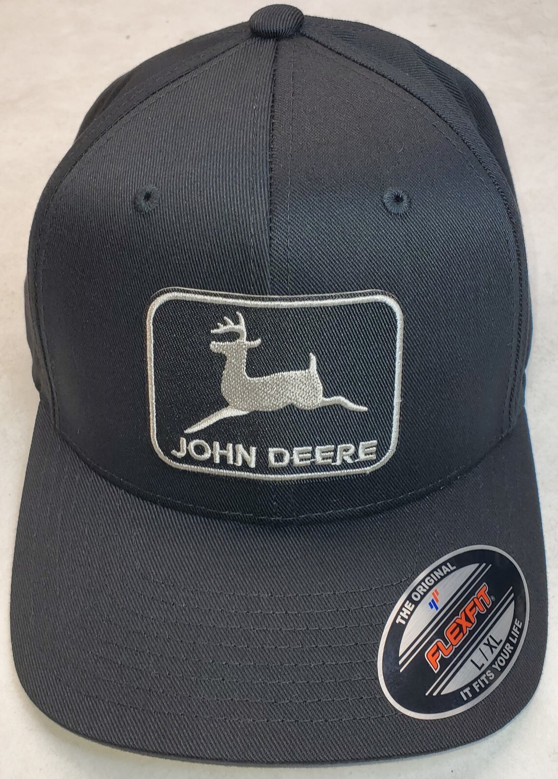 John Deere Black Patch on Flexfit Style 6277 Hat / Black – L/XL 7 1/8″ – 7 5/8″