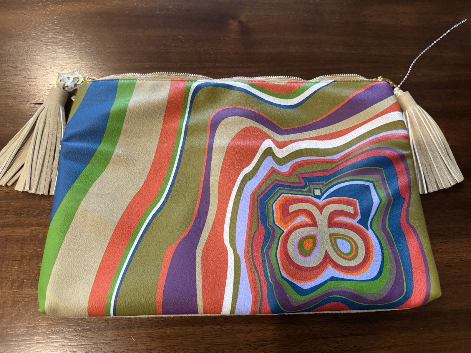 Arbonne “Treasures of the Rainforest” Multi-Color Swirl Foldover Tassel Clutch