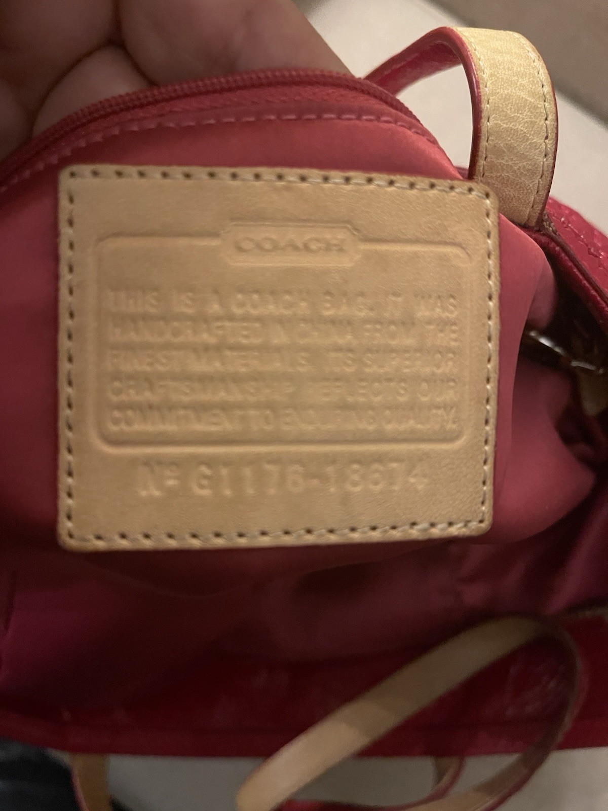 Coach Poppy Daisy Liquid Gloss tote bag, featuring quilted red patent leather