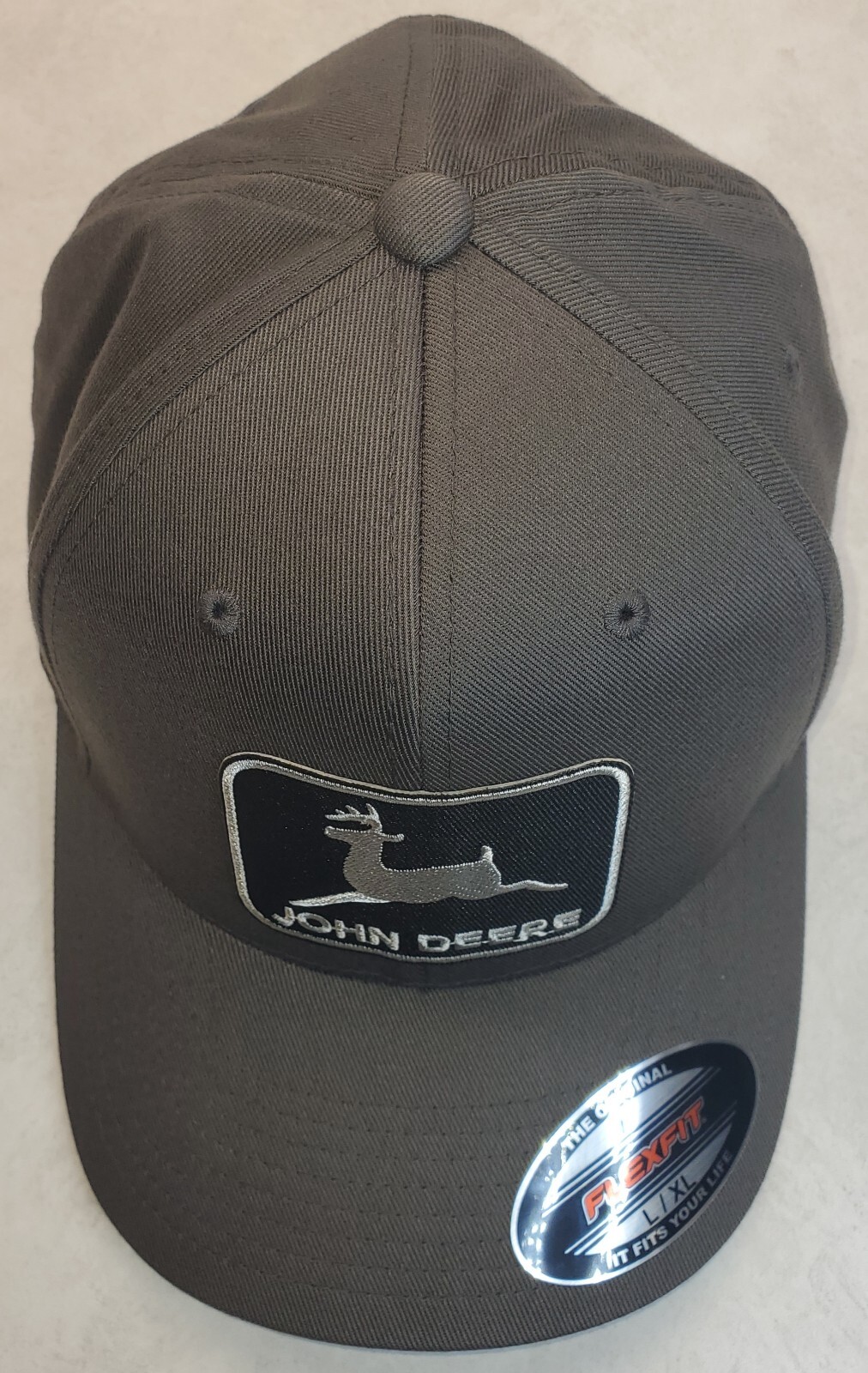John Deere Black Patch on Flexfit Style 6277 / Charcoal – L/XL 7 1/8″ – 7 5/8″