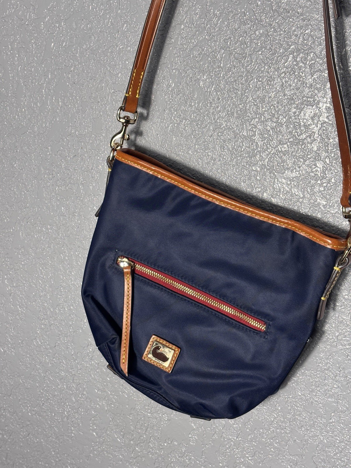 Dooney & Bourke Navy Crossbody Bag Zip Top Brown Leather Strap Gold Hardware