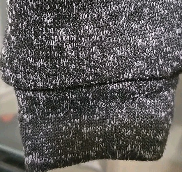 Australia Size Small hooded Jacket. It has a Kangaroo Embroidered on The Front