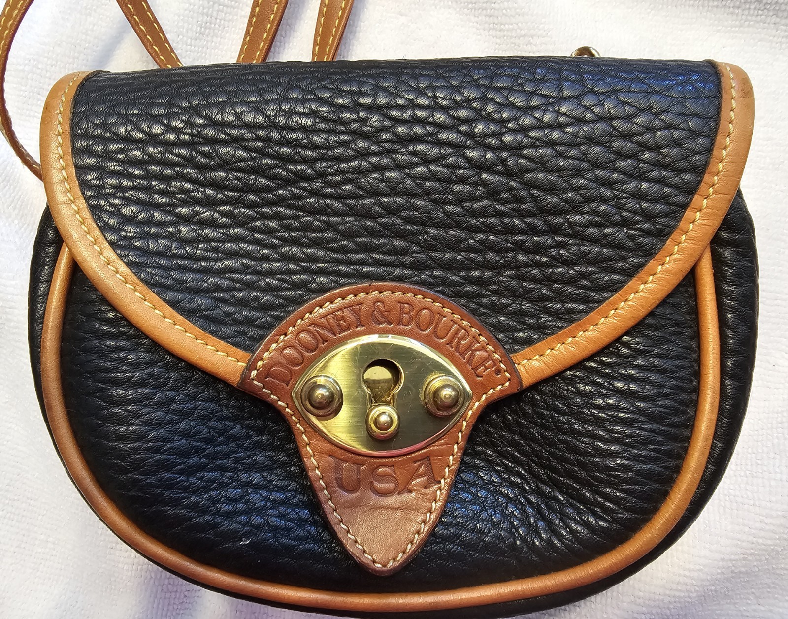 Dooney & Bourke Calvary Black/Brown Crossbody, Gold Hardware Charm.