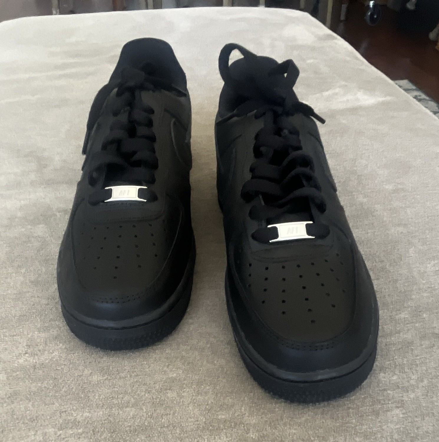 Nike Air Force 1 Men’s Low Top Lace-Up Black Solid Athletic Sneakers