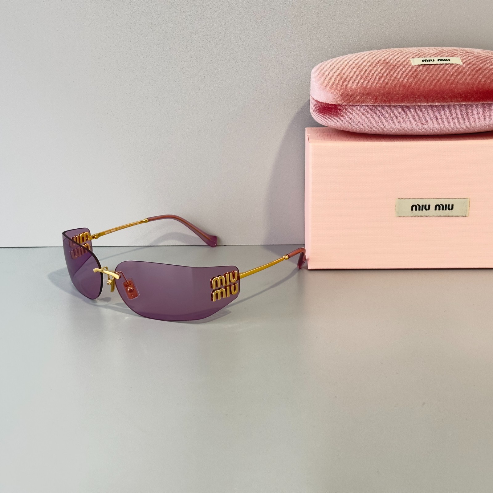 Miu Miu MU A51S Rimless Shield Sunglasses Pale Gold Frame Pink Purple Lens New