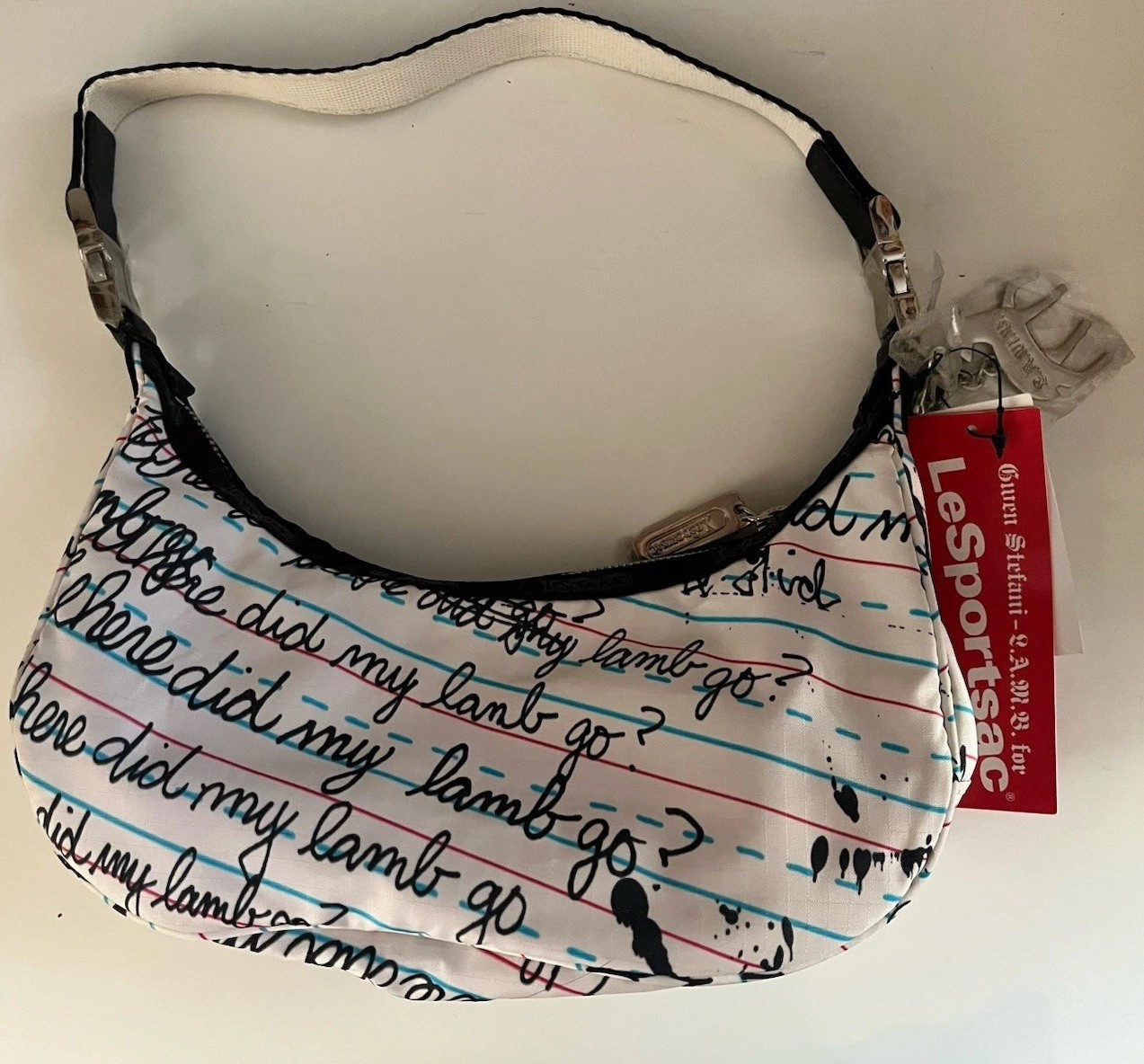 L.A.M.B. LeSportsac by Gwen Stefani small penmanship hella hobo with charm NWT