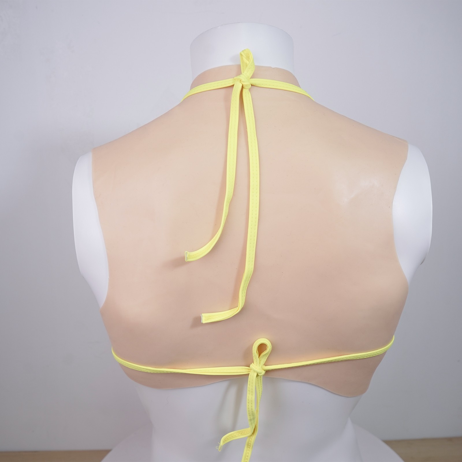 Silicone breasts designed specifically for cross-dressers to enhance bust size.