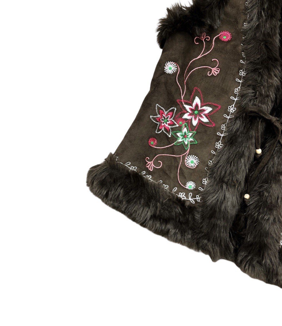 The ultimate Y2K boho chic embroidered faux fur vest
