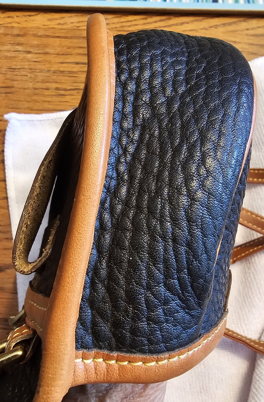Dooney & Bourke Calvary Black/Brown Crossbody, Gold Hardware Charm.