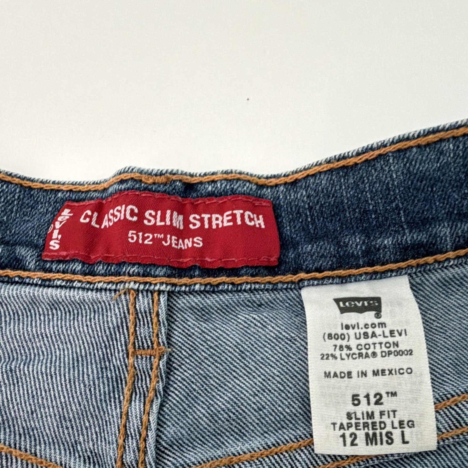 Levi’s Women’s Dark Wash Blue Denim Slim Fit Stretch Tapered Jeans, 5-Pocket