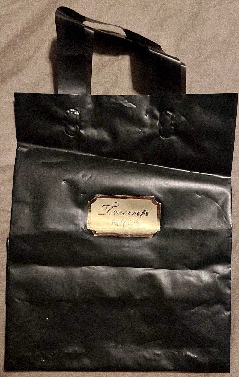 TRUMP NYC PLASTIC SMALL BLACK BAG / GIFT BAG (10”X8”X5”)(not including handles)