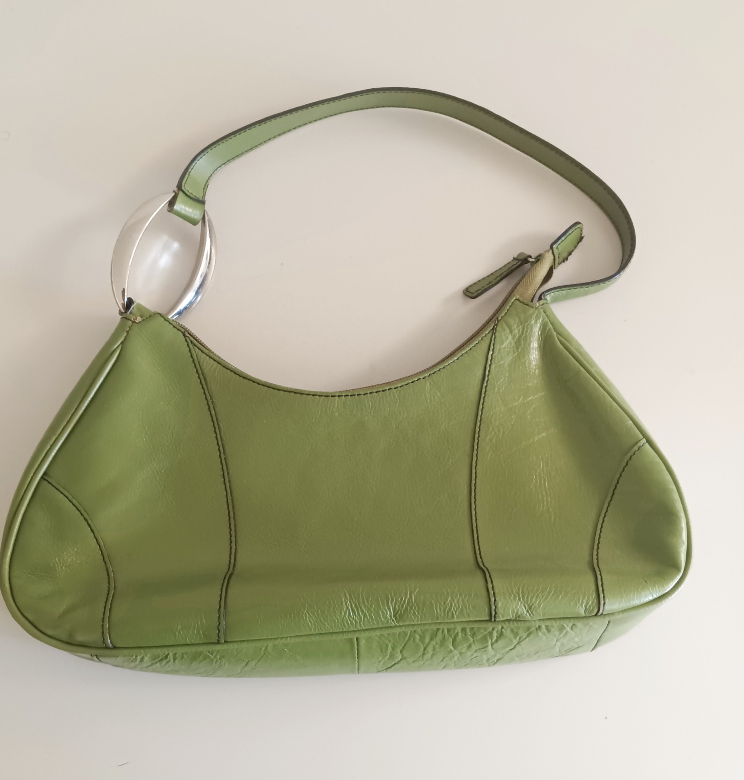 Franco Sarto purse green. Large silver colored handle ring. Pre-owned in great c
