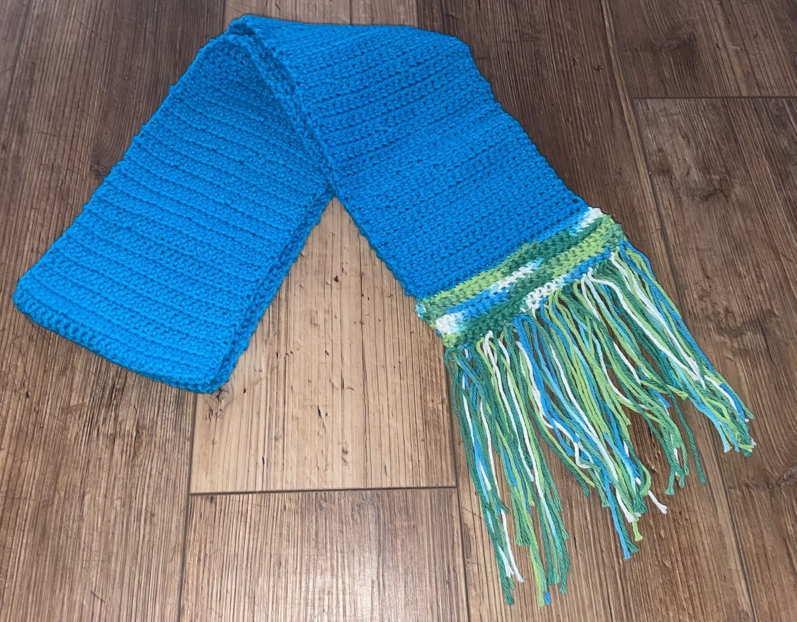 Homemade Crocheted Scarf With Fringes On The End
