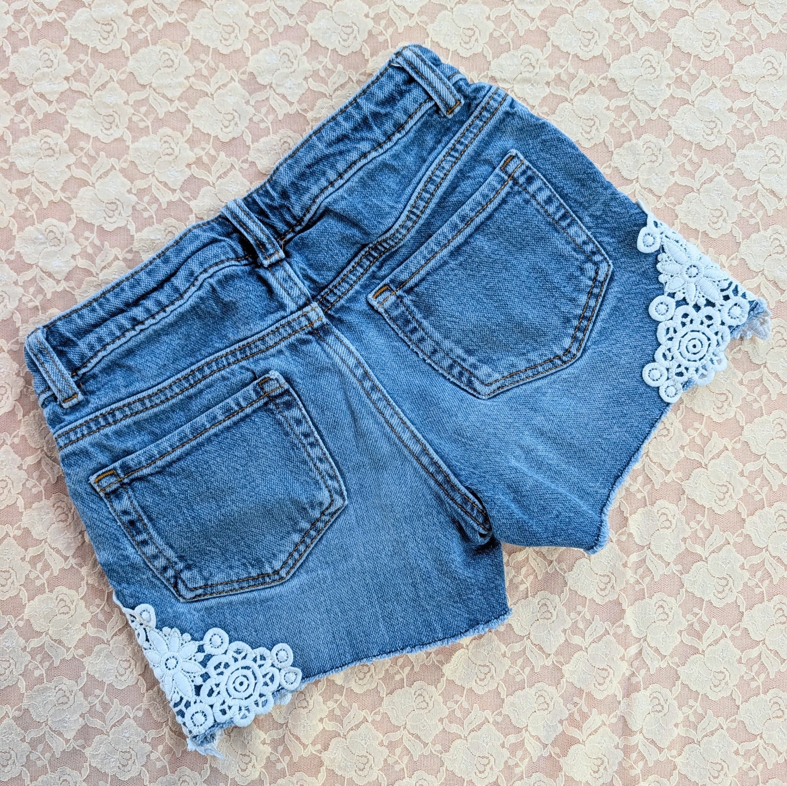 VGUC Cat & Jack denim shorts with lace design size youth medium 7/8