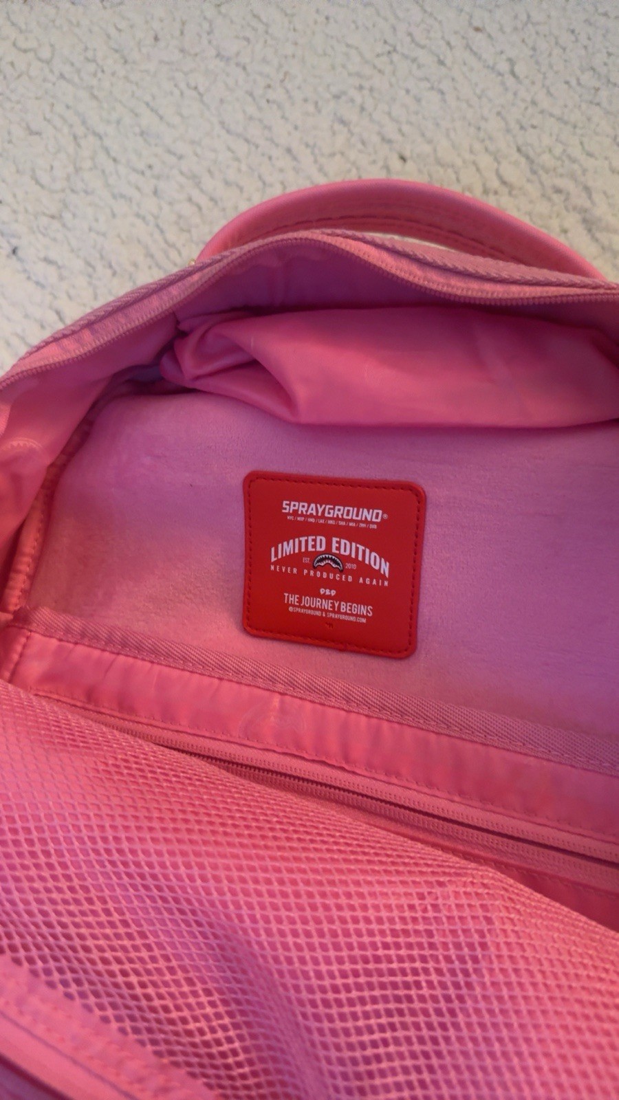 Pink Spray Ground Backpack