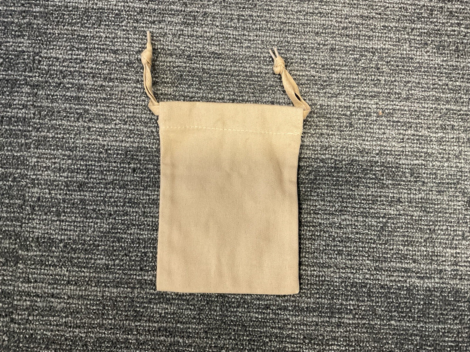 Christian Louboutin tan cloth drawstring pouch 5×6.75′