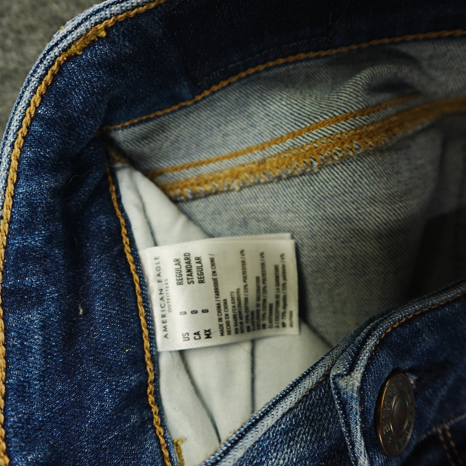 American Eagle Hi-Rise Jegging Distressed Ripped Raw Hem Blue Wash Jeans