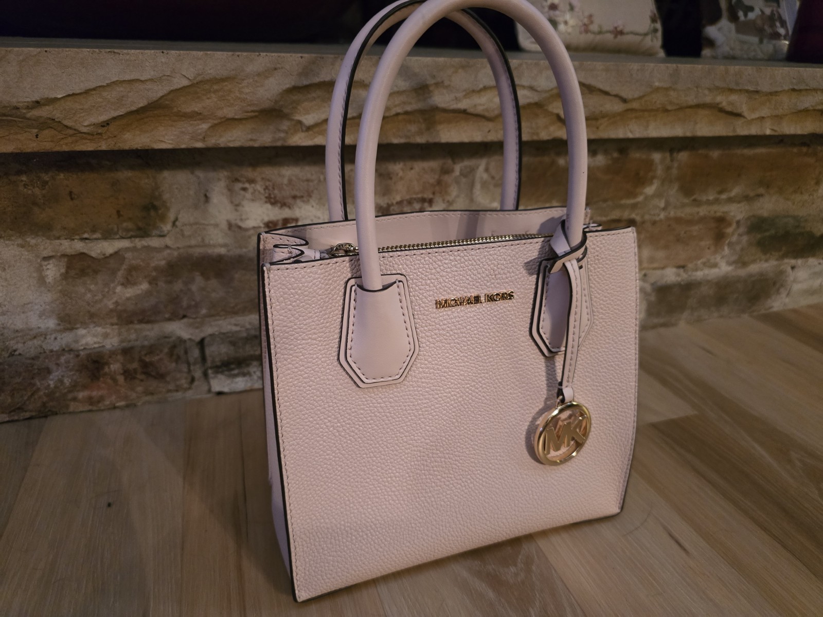 Michael Kors Pink Powder Blush Leather Bag is 10 x 9″ and 6″ deep