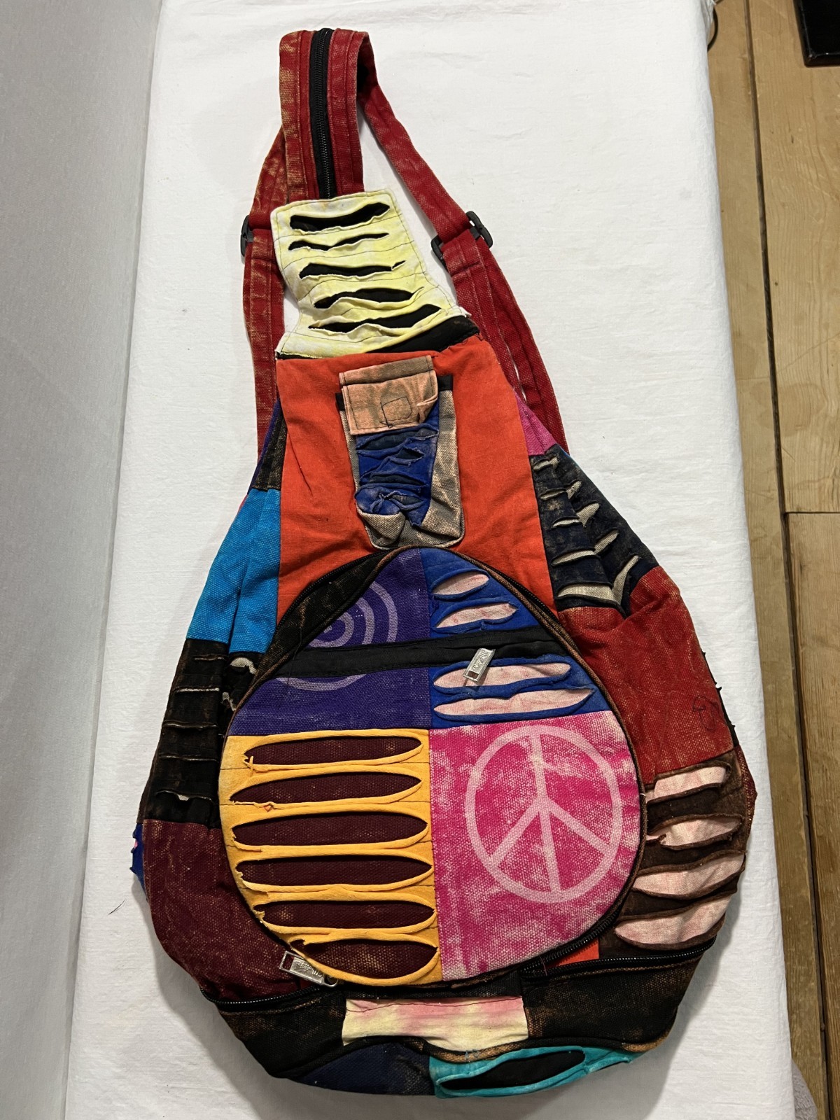 NWOT Patchwork Cotton Fold up Backpack Stonewash Multicolor Peace Sign ~15 x16″