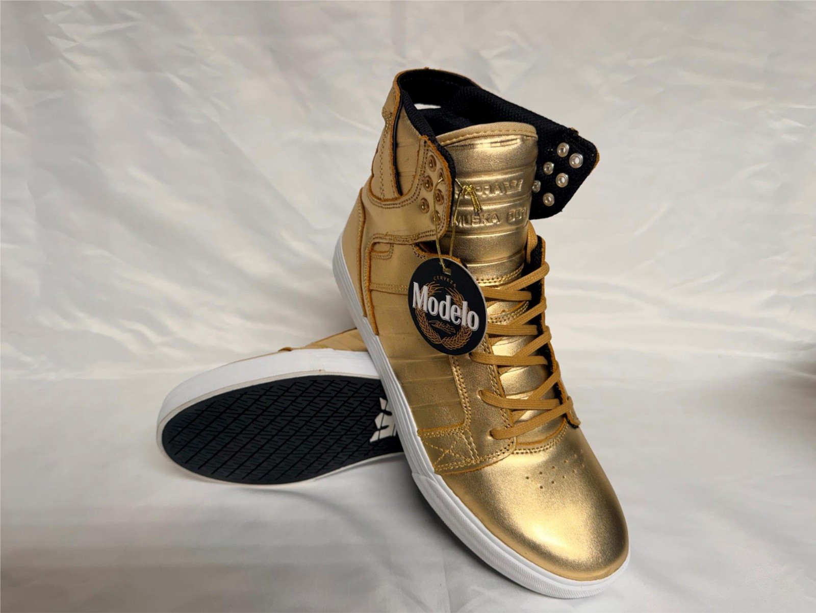 The SUPRA x Modelo Skytop Modelo Especial Gold Foil 08003-718-M