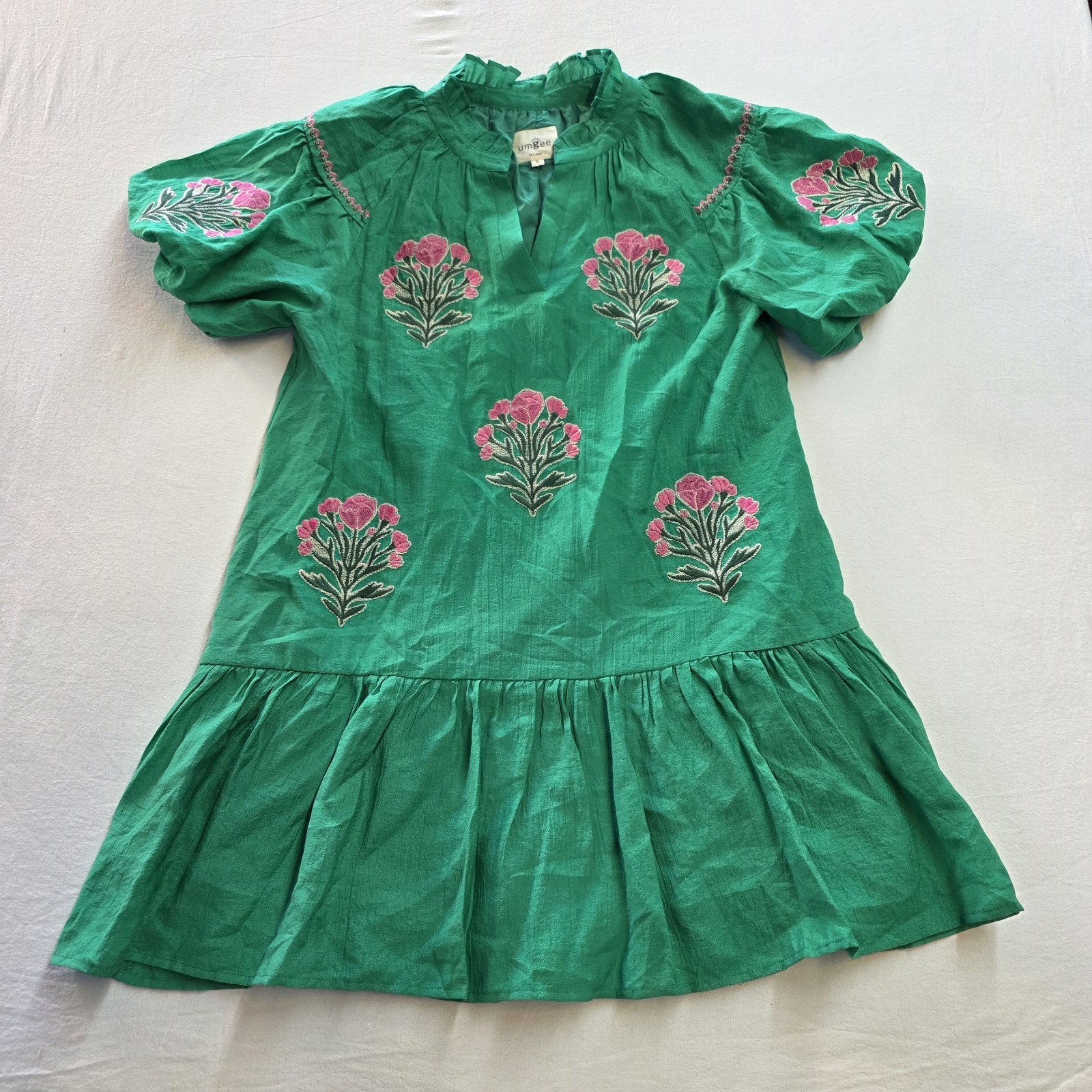 Umgee green dress features distinct floral embroidery and a charming drop waist