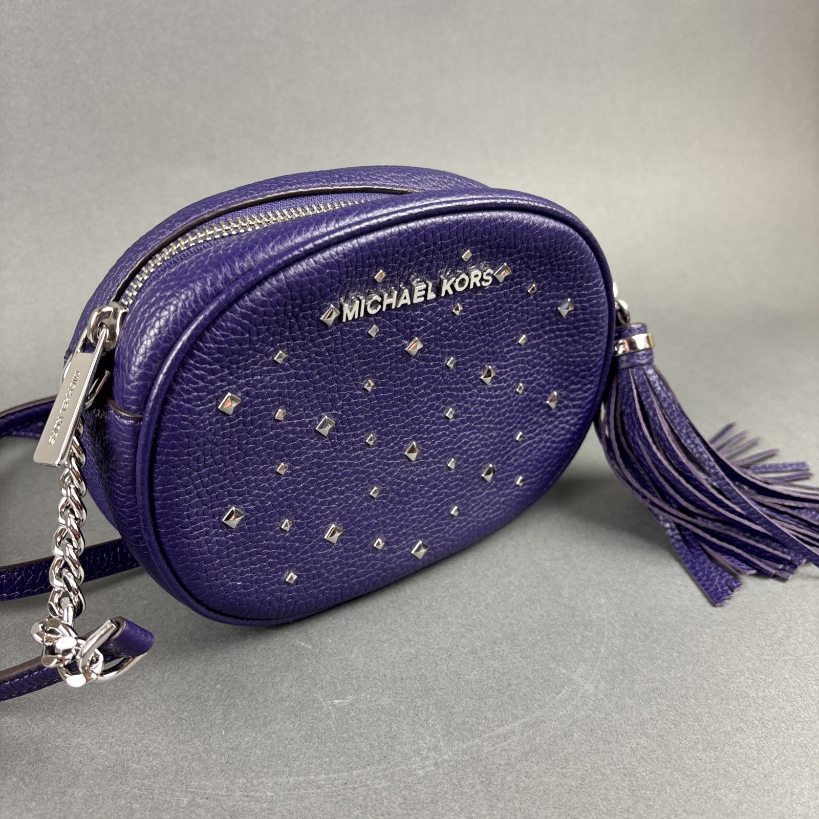 Michael Kors Purple Pebbled Leather Small Oval 7.75″x5.5″ Crossbody Bag w/Tassel