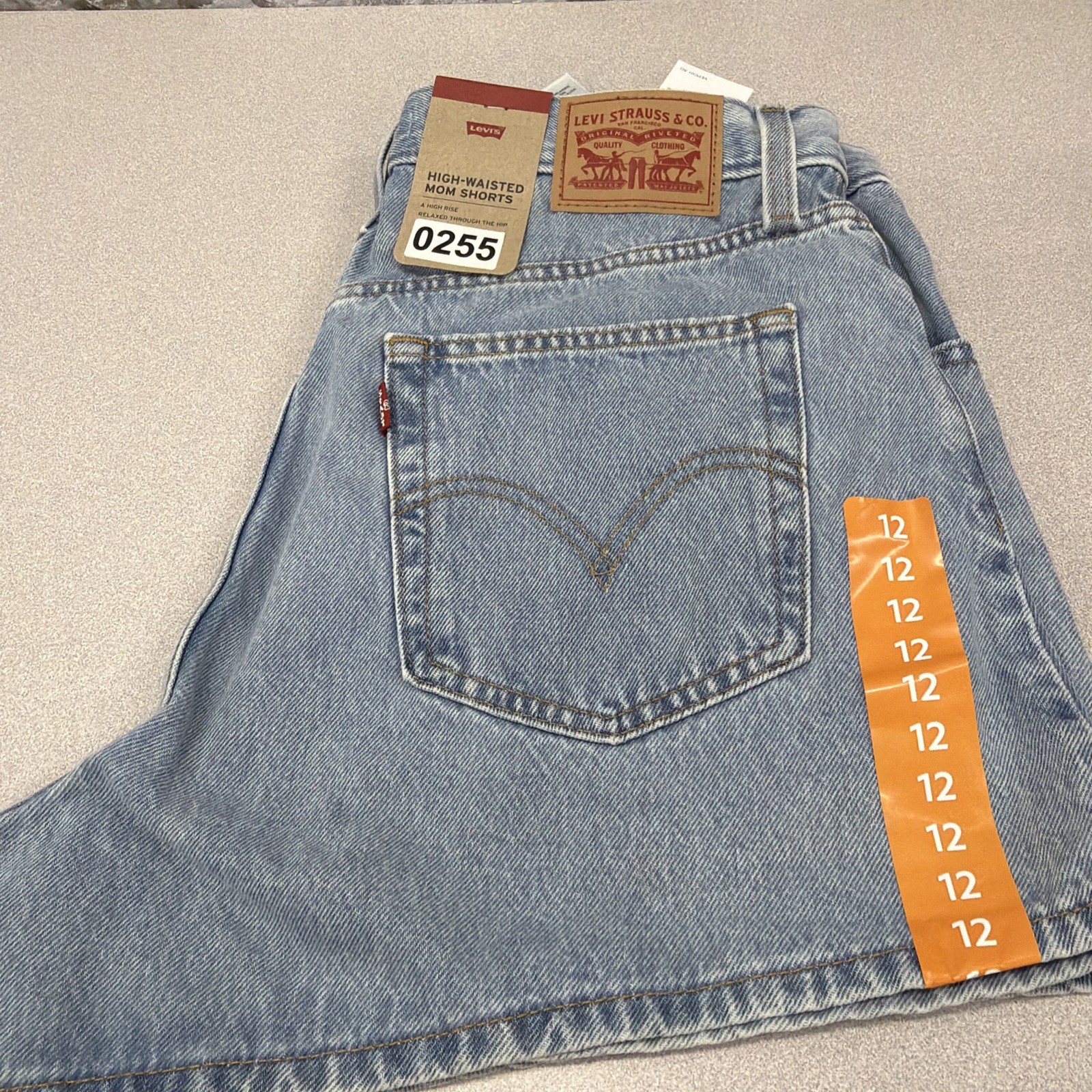 Levi’s Women’s High-Waisted Relaxed Fit 5 Pocket Cotton Denim Mom Short, 31, 12