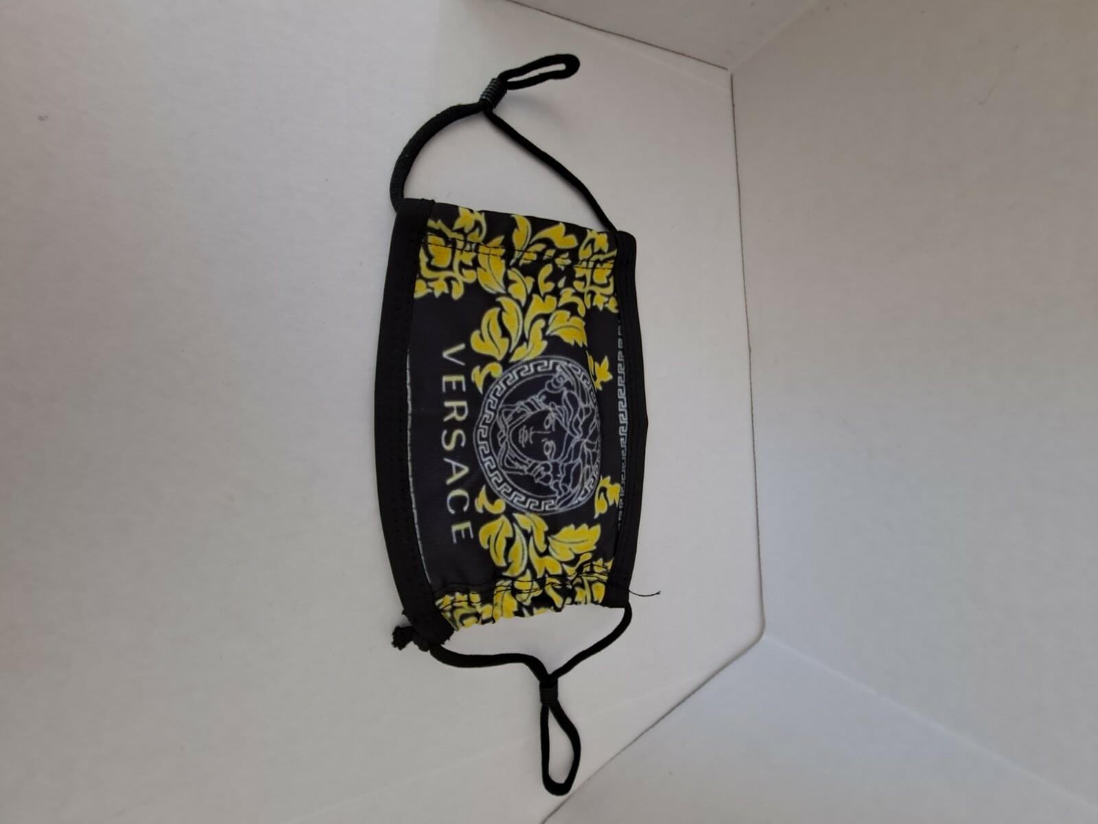 Adjustable re- usable face mask with filter pocket 