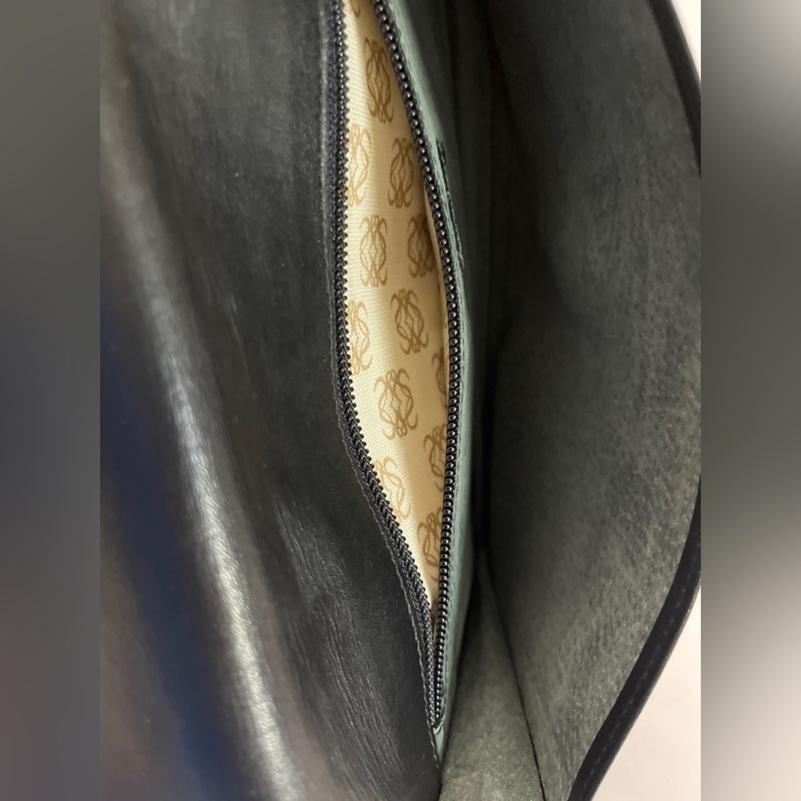 Loewe Anagram Clutch Black Leather Sleek Minimalist Spanish Designer Luxury