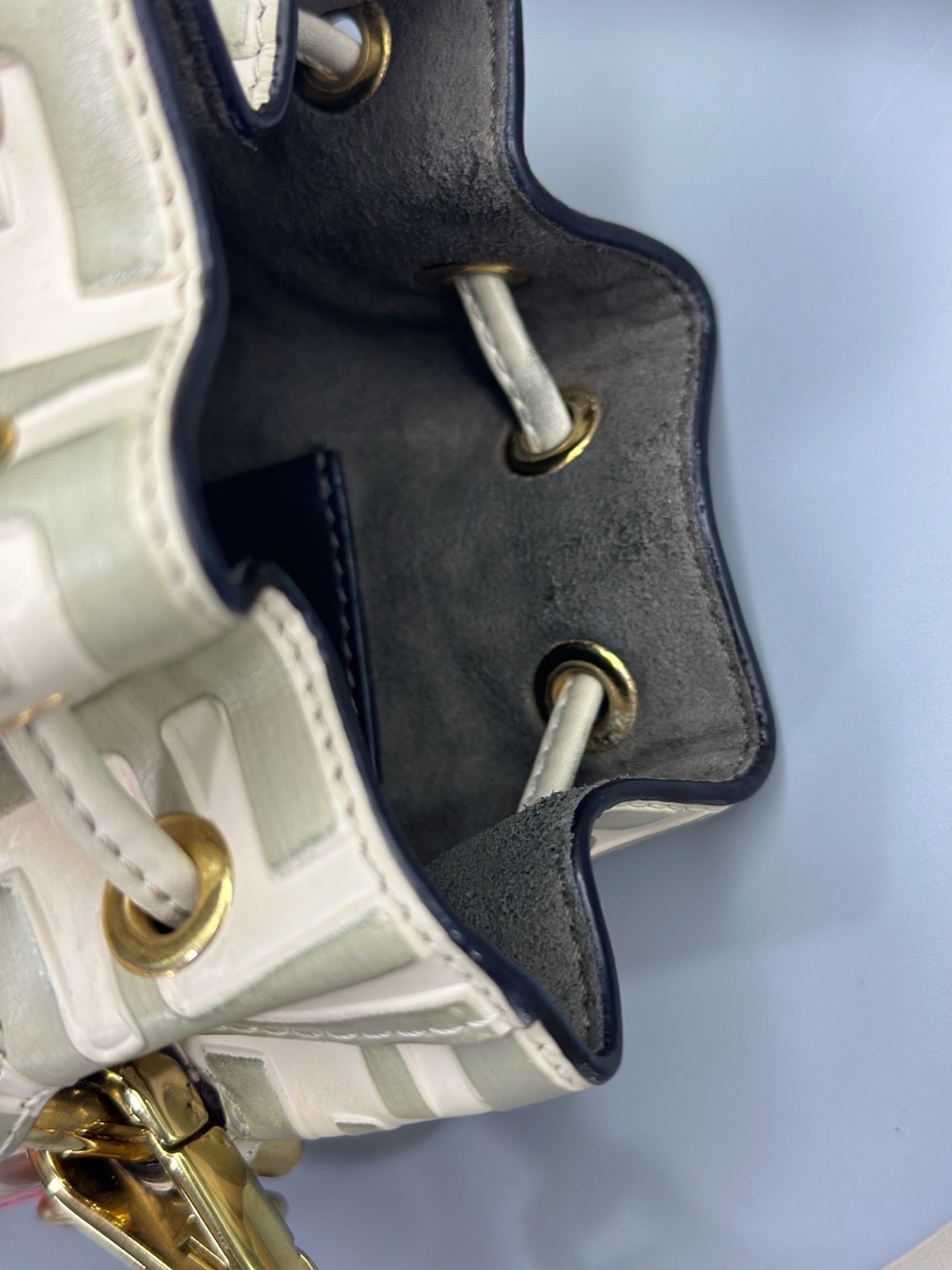 FENDI Mon Tresor Bucket Crossbody Bag FF Mini Off-white Embossed Leather Gold HW