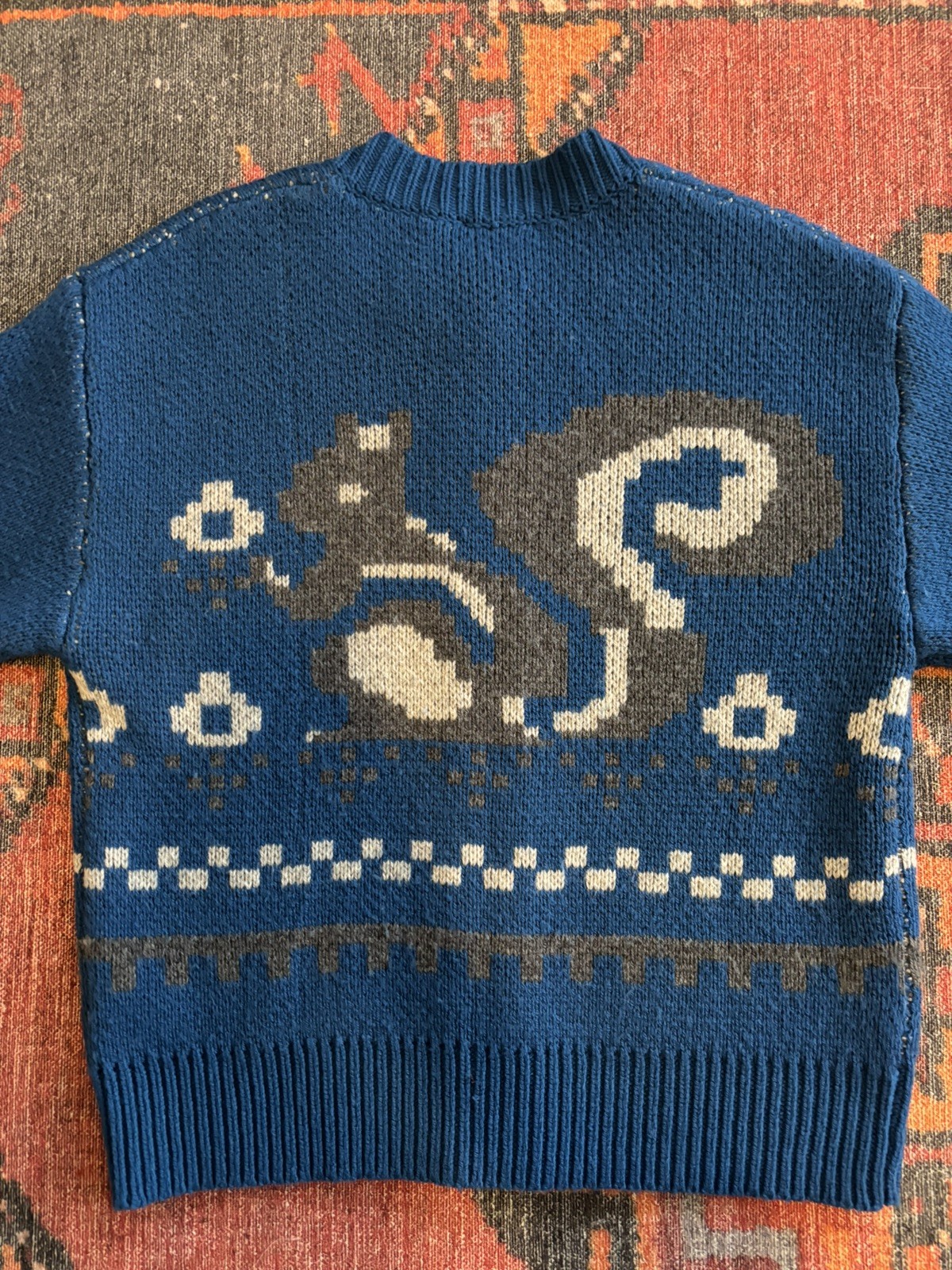 Damson Madder Romily cardigan blue with intarsia squirrel