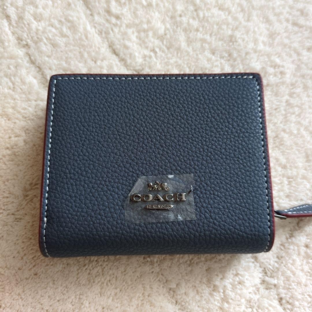 Brand new unused limited collaboration Coach Snoopy bifold wallet with box navy