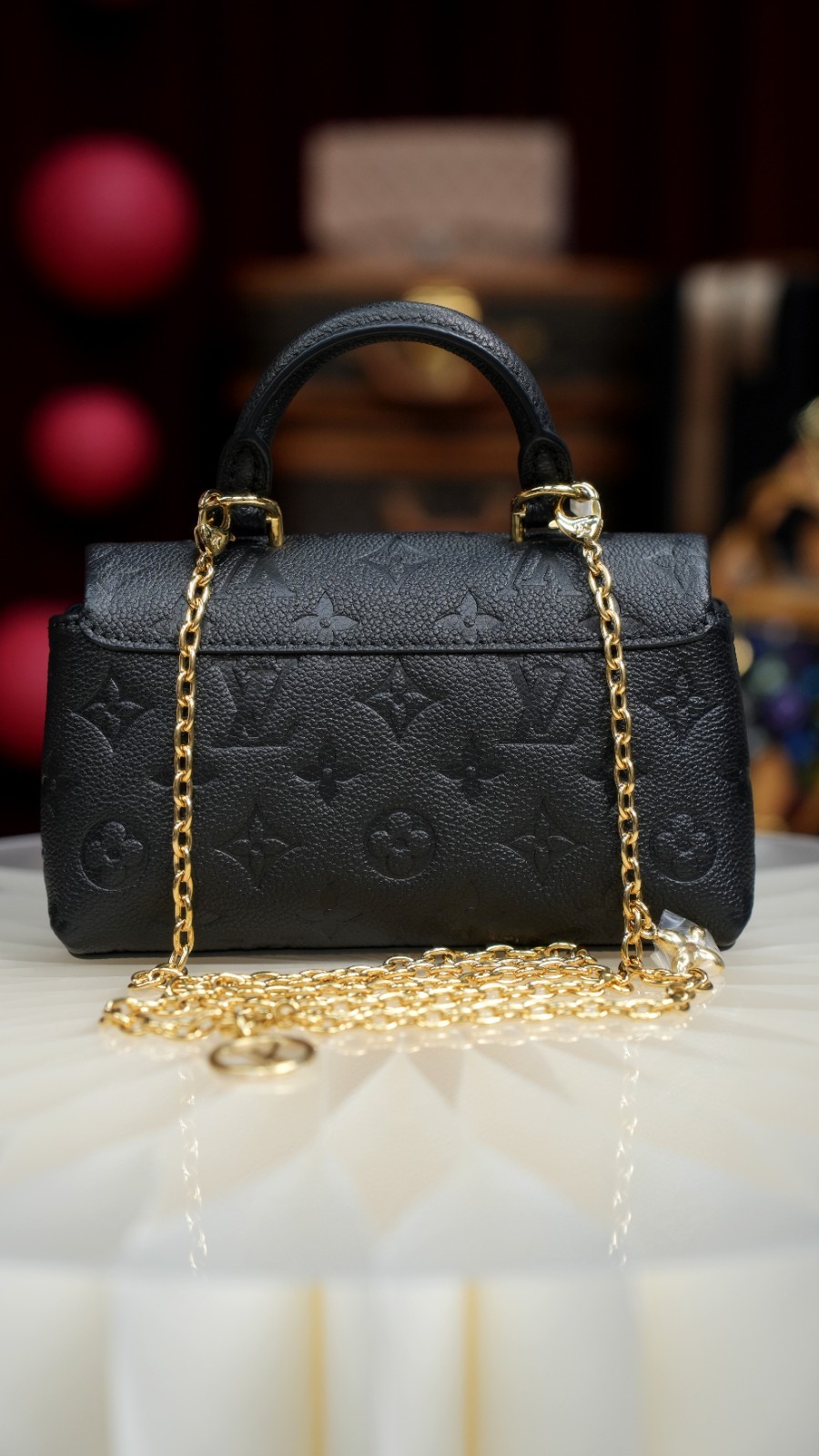 LOUIS VUITTON Madeleine Monogram Empreinte Top Handle Chain Shoulder bag Women
