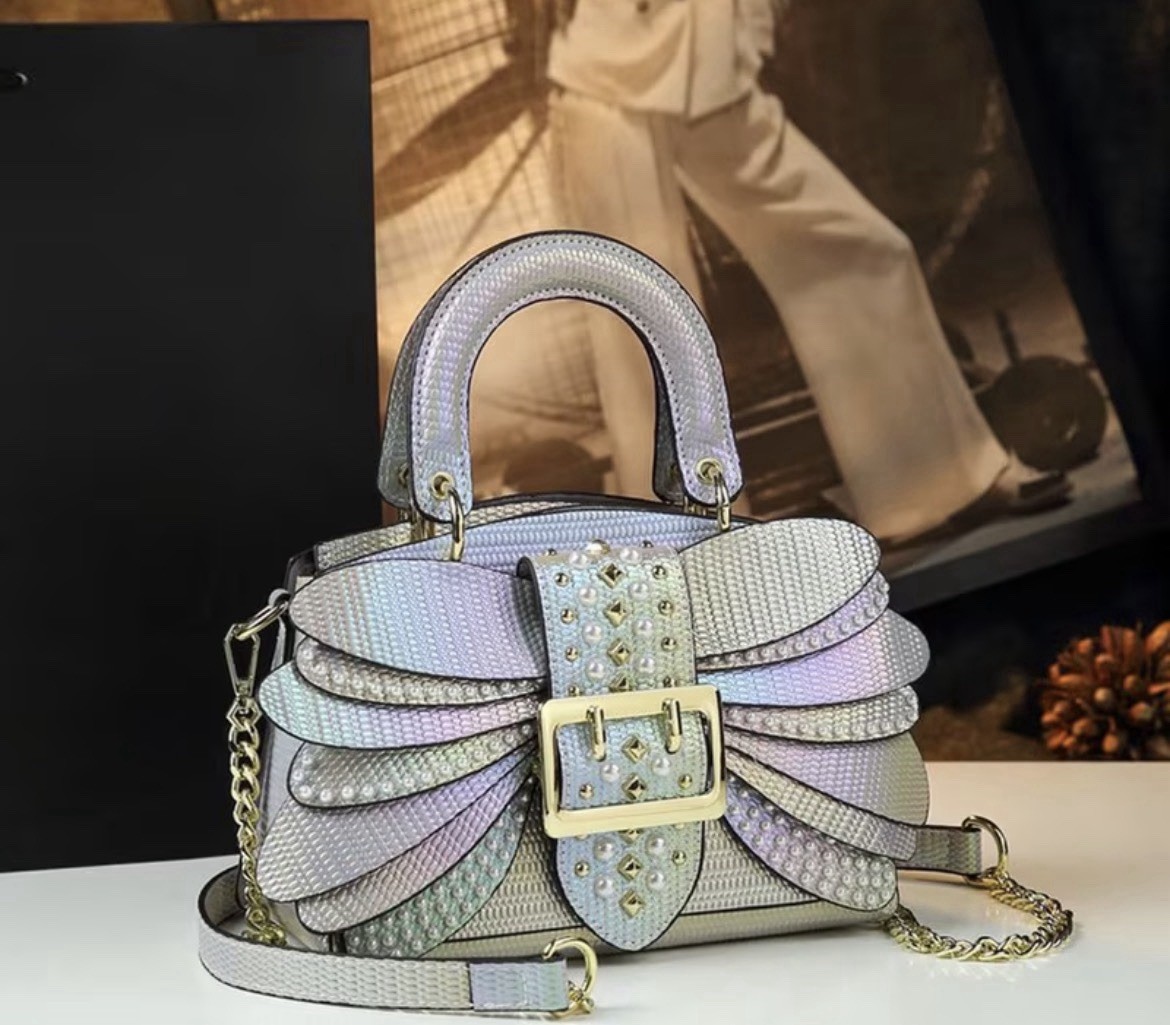 A rainbow-colored bag will match your dress.