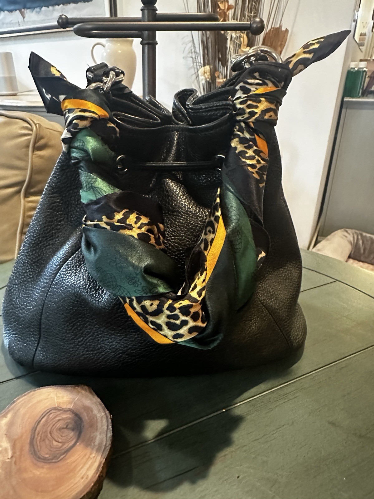 Coach Avery bucket bag. Drawstring closure and silver-tone hardware.