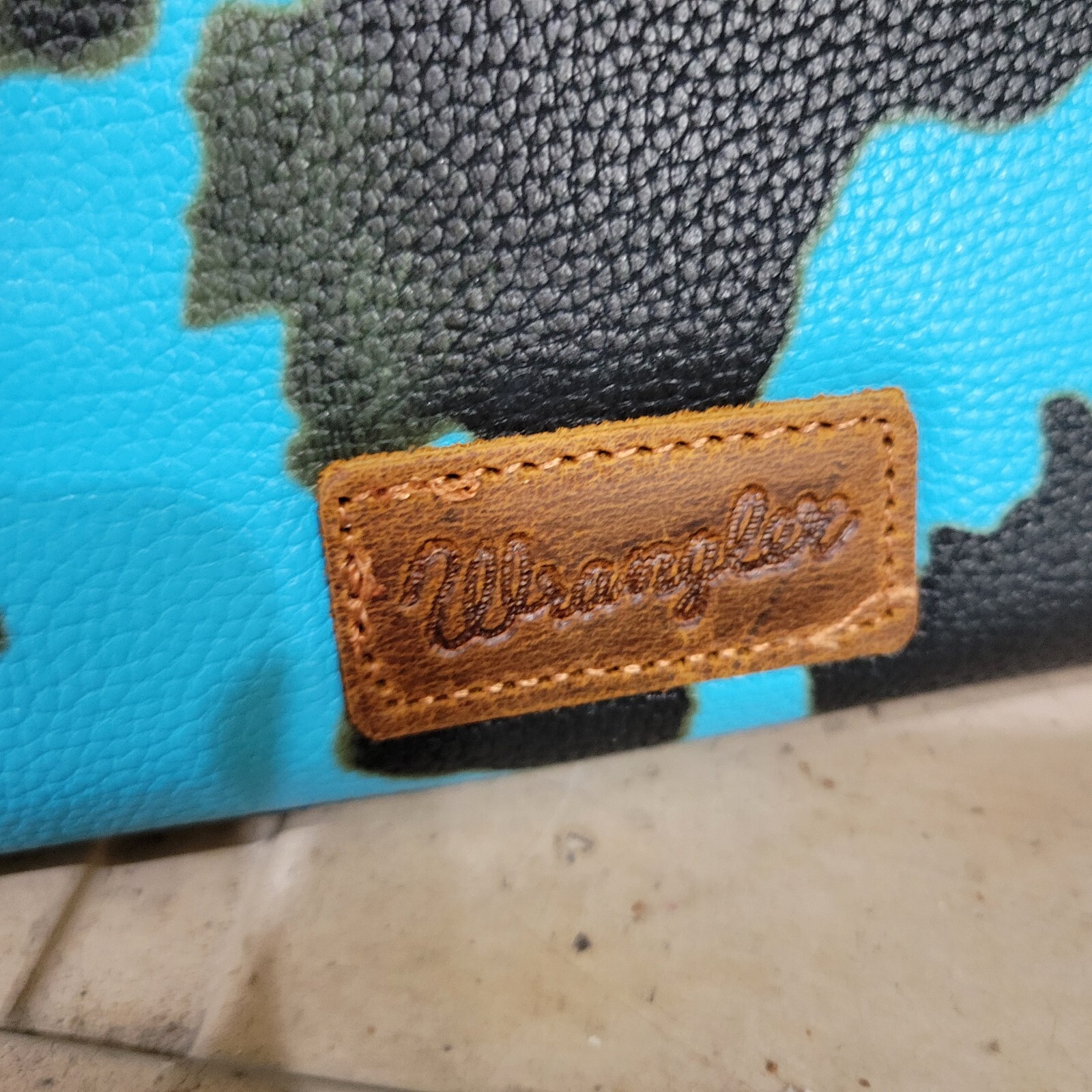 Wrangler Women’s Cow Print Bi-Fold Wallet Turquoise And Black 7.5 X 3.5 Inches