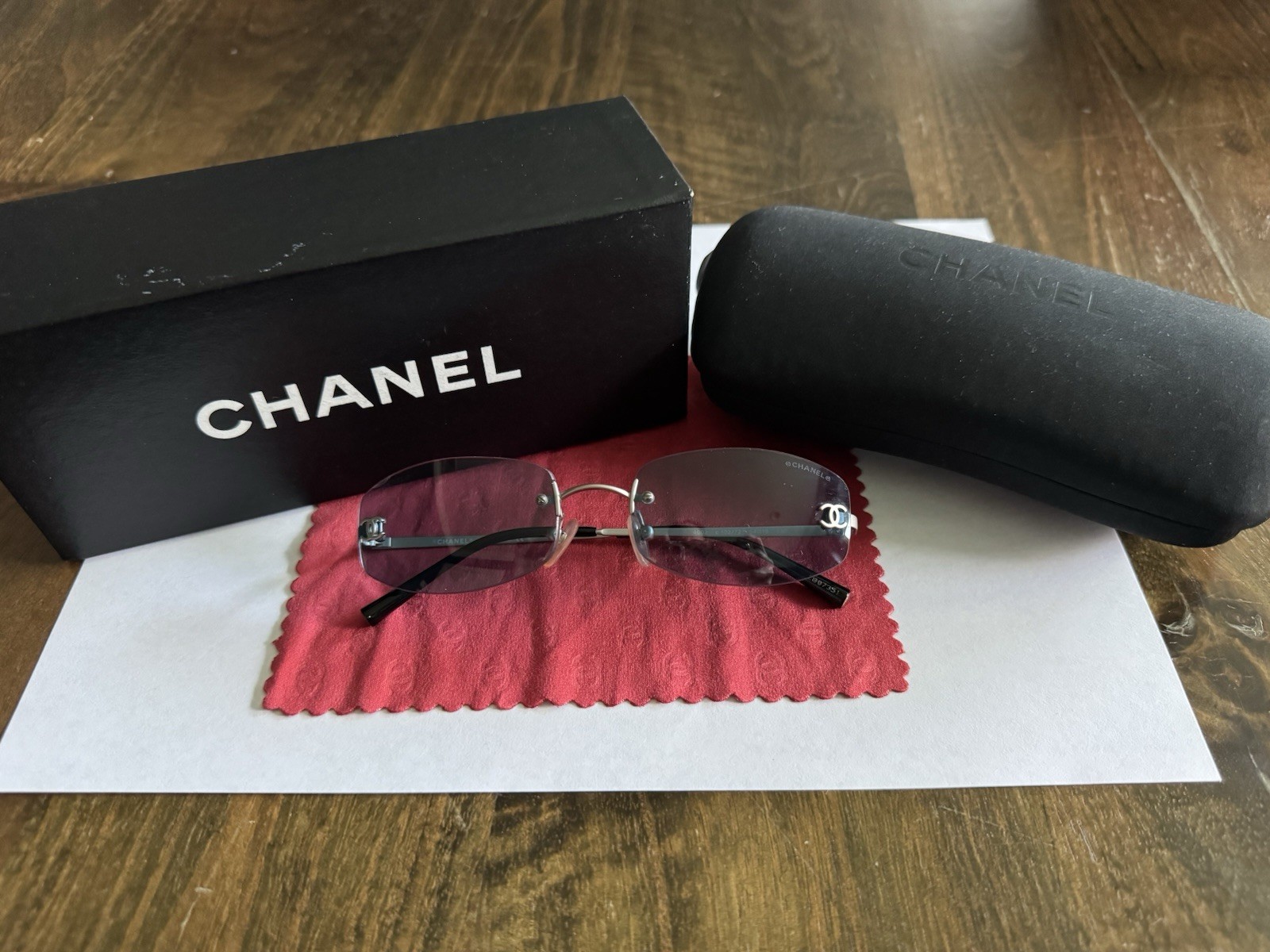 Vintage CHANEL 4002 Rimless Sunglasses Tinted Blue Lenses Silver Metal Frame