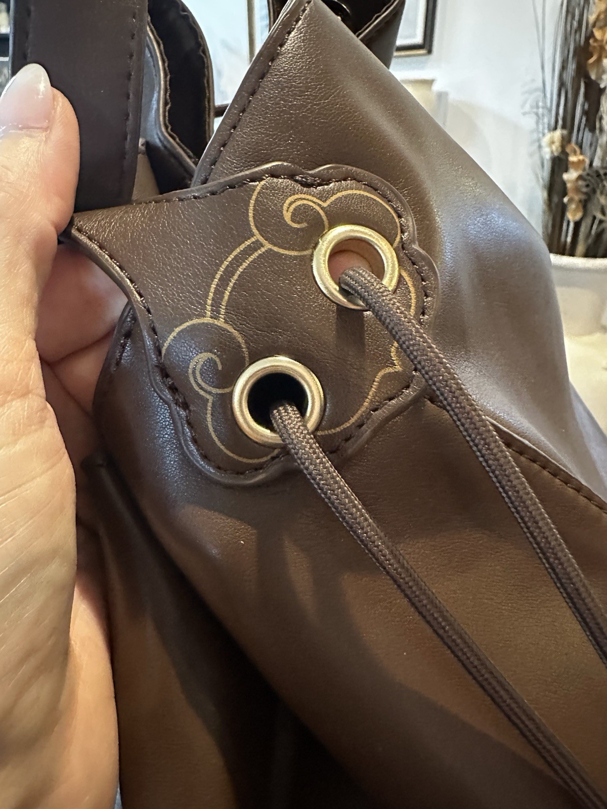 Inside Out Women Brown Bucket Drawstring Bag | Detachable Strap | Gold | Pockets