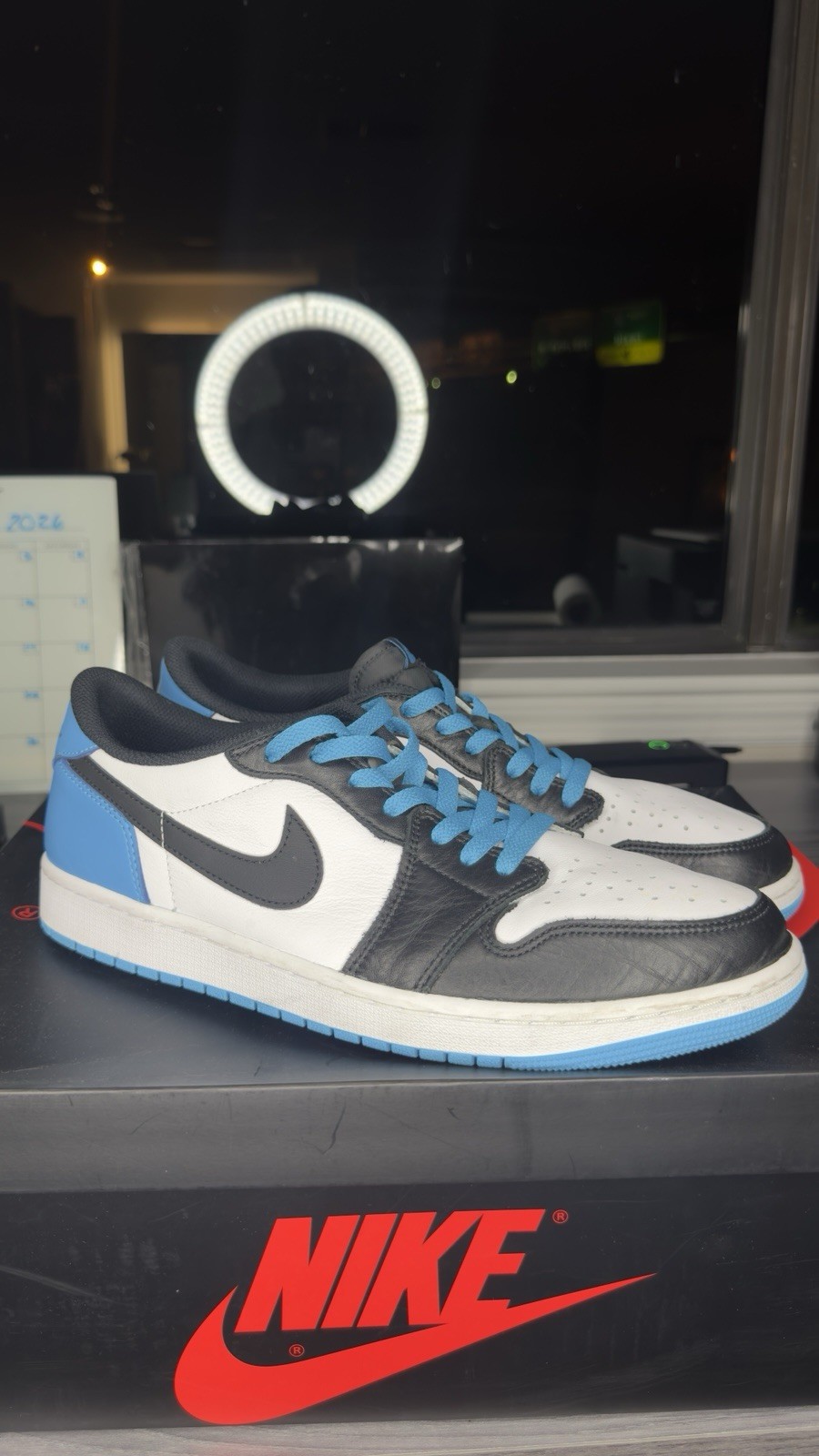 Nike Air Jordan 1 Low OG ‘UNC – Dark powder blue sneakers in white/black/blue