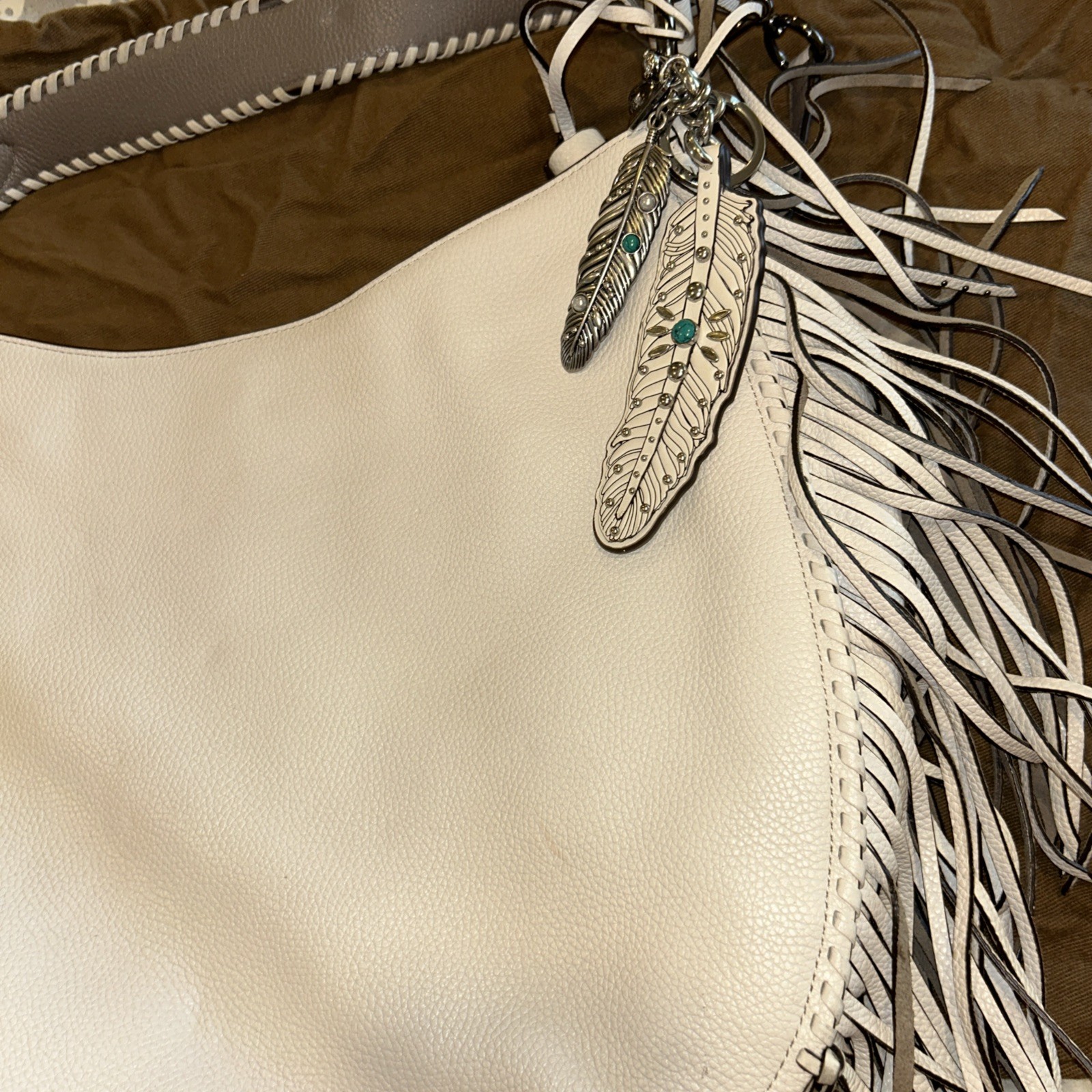 Coach Rare Turquoise and Silver Feather Hang Tag. Excellent Condition