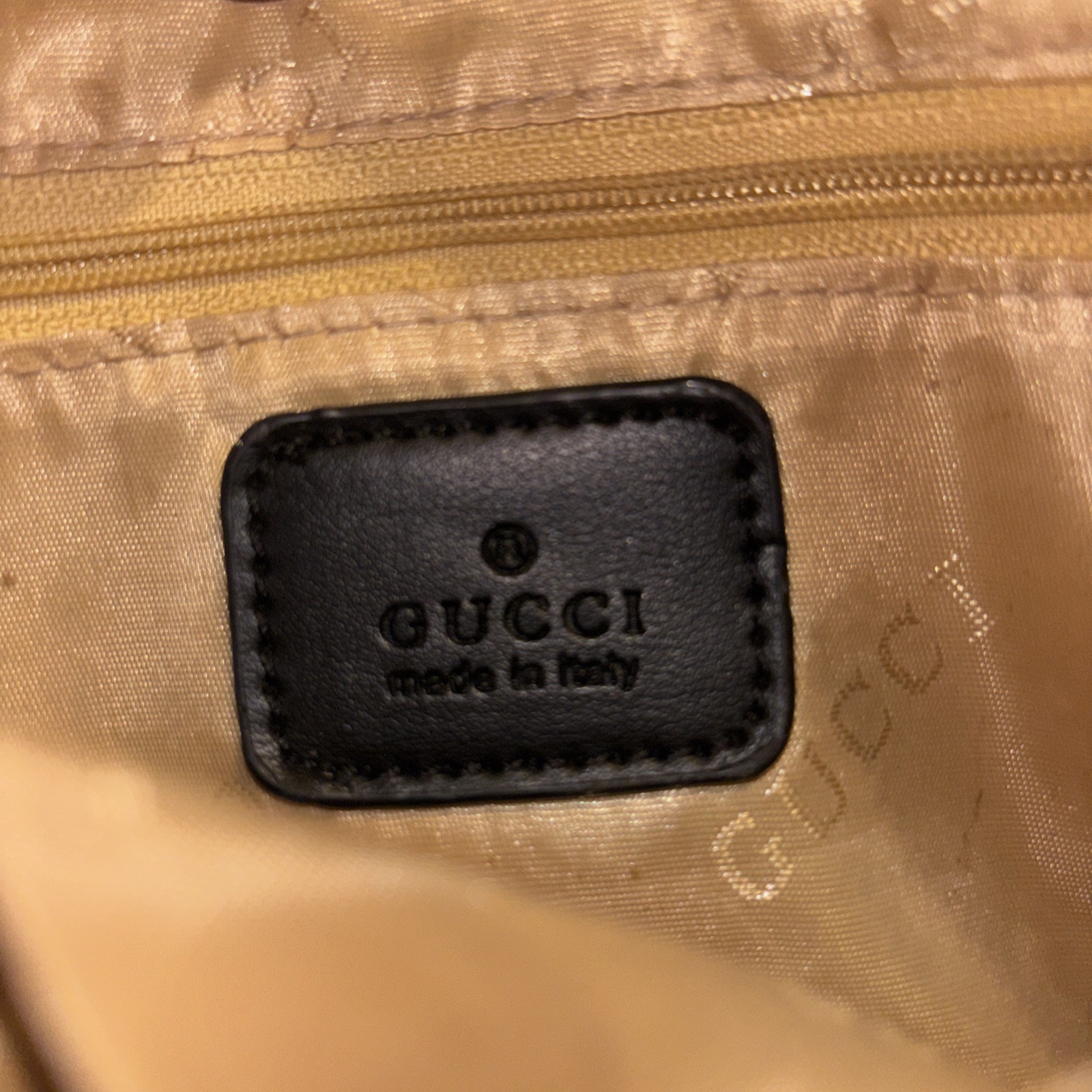 This is a Gucci GG Supreme Ophidia camera-style shoulder bag.