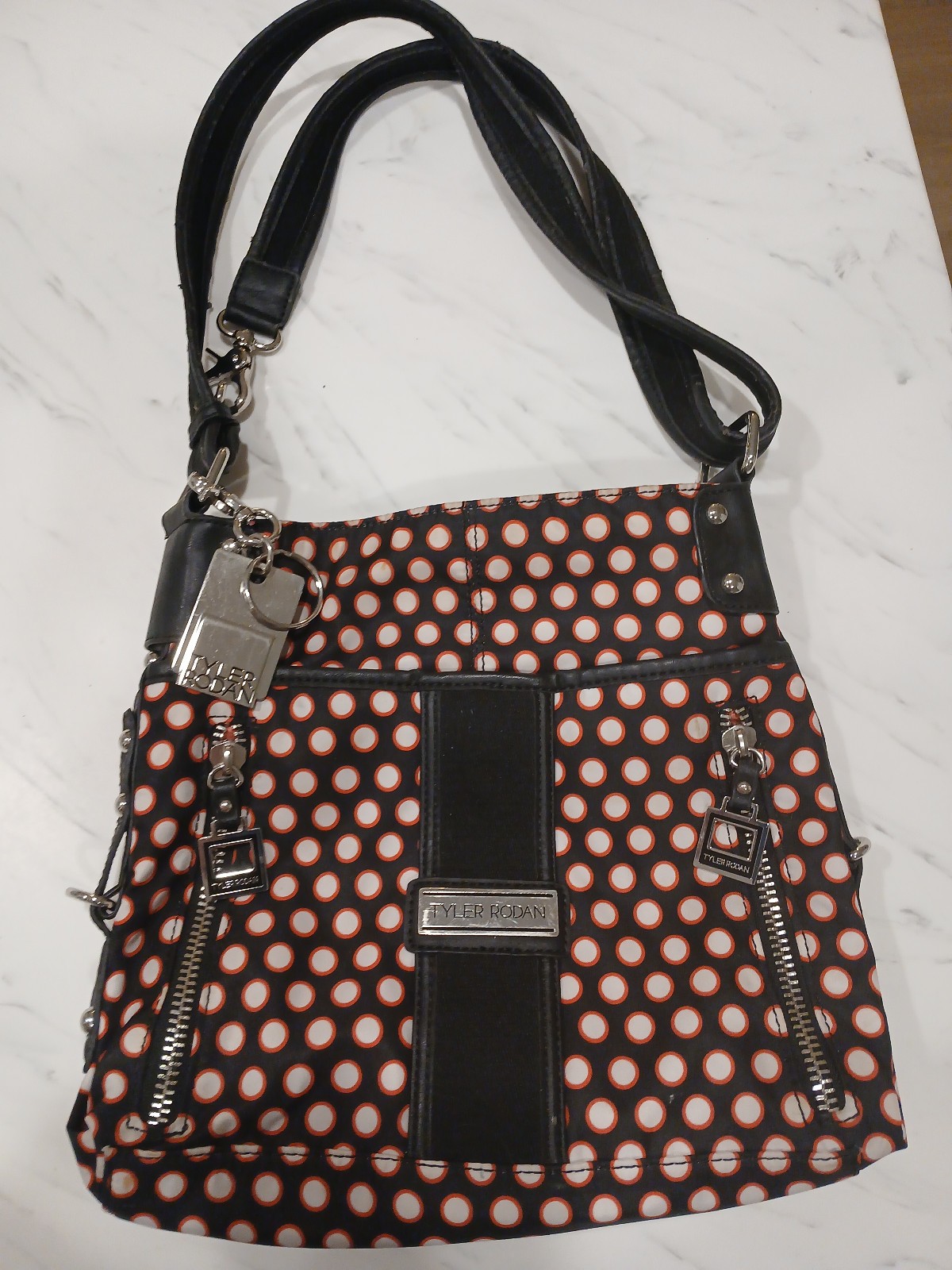 Tyler Rodan Crossbody Handbag, silky quilted black with pink/white polka dots