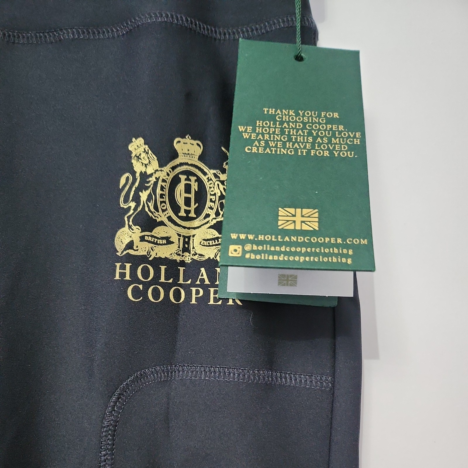 HOLLAND COOPER SPORT LEGGING IN BLACK/GOLD. UK MEDIUM.