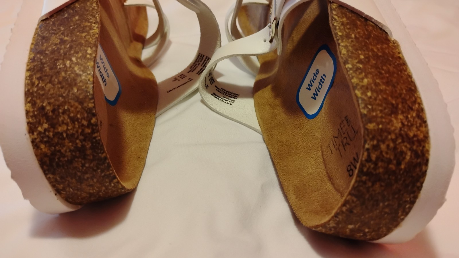 Open Toe And Open Back White Sandals With Buckles On Top