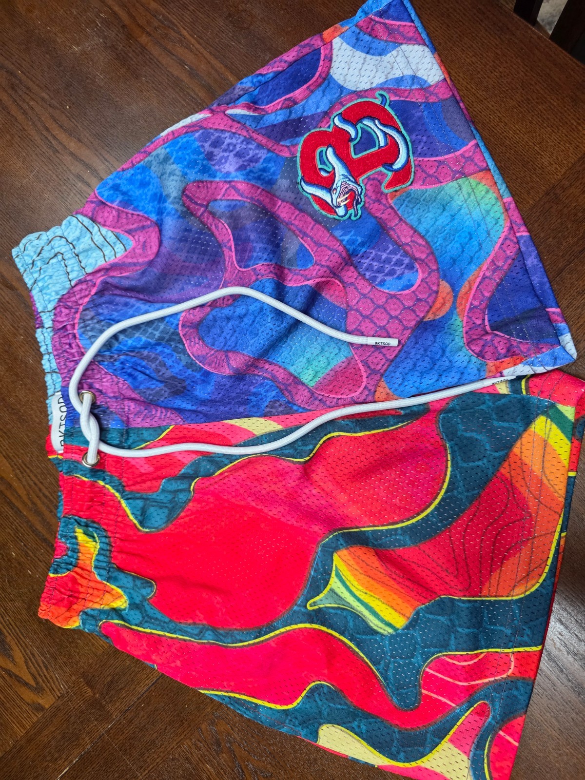 mens muliti-colored bucketsquad shorts size small NWOT